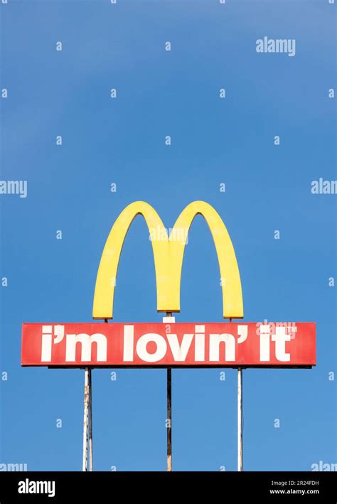 McDonald's logo sign and I'm Lovin' It slogan with copy space Stock Photo - Alamy