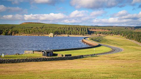 Kielder Dam on a sunny day Photograph by David Head - Pixels