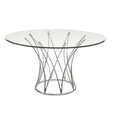 a round glass table with metal legs