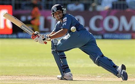 Rohit Sharma sweeps during his innings of 38 | ESPNcricinfo.com