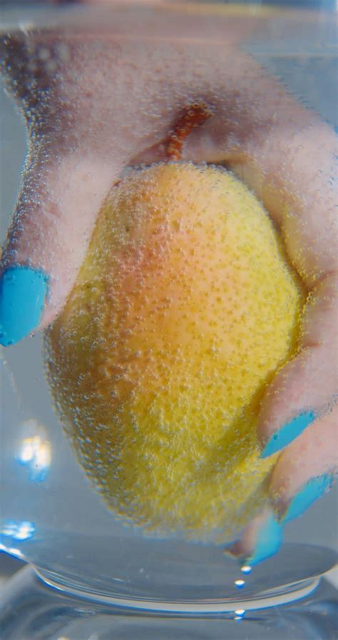Woman Holding Fruit Underwater · Free Stock Video