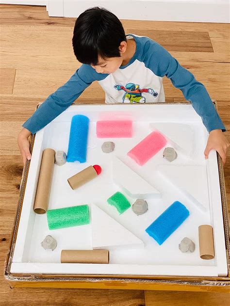 Giant Cardboard Ball Maze - Fun recycled STEM project for kids