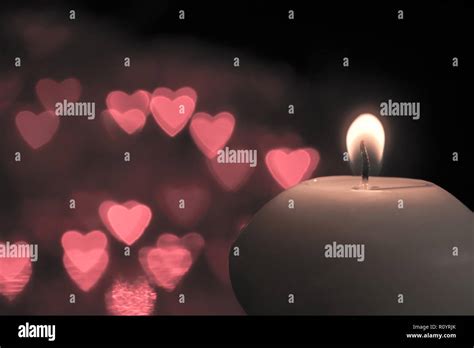 Candle on bokeh hearts background. Vintage style Stock Photo - Alamy