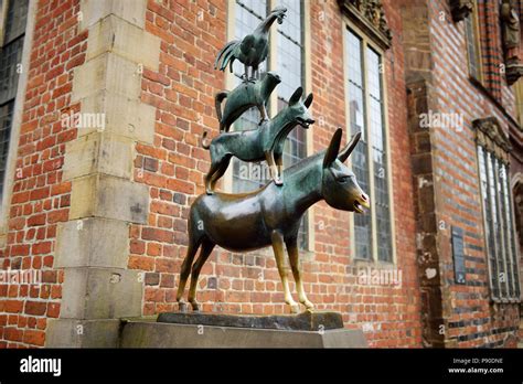 Famous statue in the center of Bremen, depicting the donkey, dog, cat ...