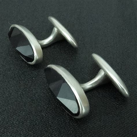 Silver and onyx cufflinks by Annika Rutlin - Pyramid Gallery