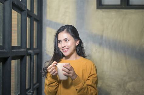 Young Beautiful Woman in Sunshine Light Enjoying Her Morning Coffee at Home Stock Image - Image ...