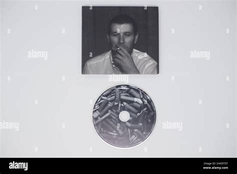 Arctic Monkeys - Whatever people say I am, that’s what I’m not album with CD on white background ...