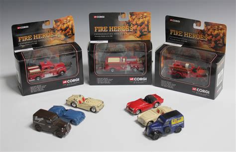 A collection of Corgi vehicles, including cars, emergency and ...