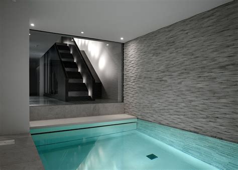 Indoor pool cladding. Carry the look of stone from wall to pool lining by using 3D cladding ...