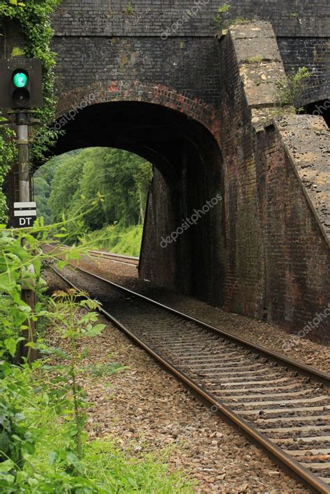 Old railway bridge with train track running through it — Stock Photo ...