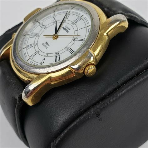 Mavin | Vintage Timex Indiglo Quartz Roman Numeral Gold Tone Case Watch ...