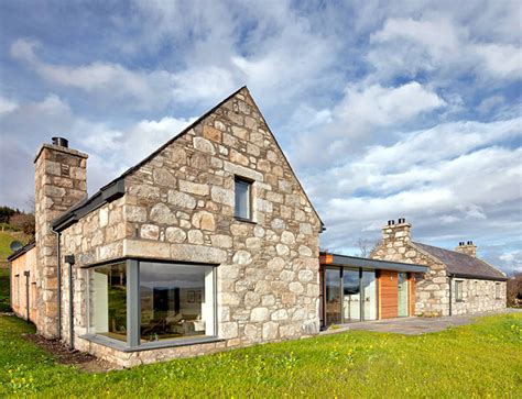 Stone and glass Torispardon House is a modern take on traditional Scottish farmhouses