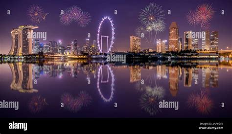 Singapore city skyline at night Stock Photo - Alamy