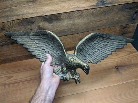 Cast Metal Eagle Wall Plaque - Bid On Estates Auction Services