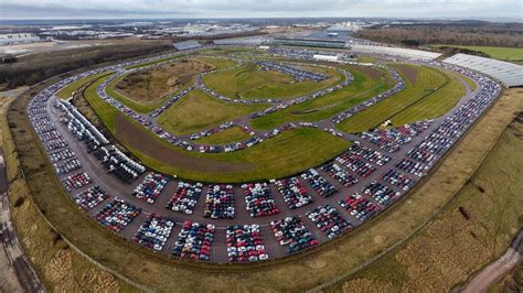 Rockingham: Ex-racetrack used to store thousands of vehicles - BBC News