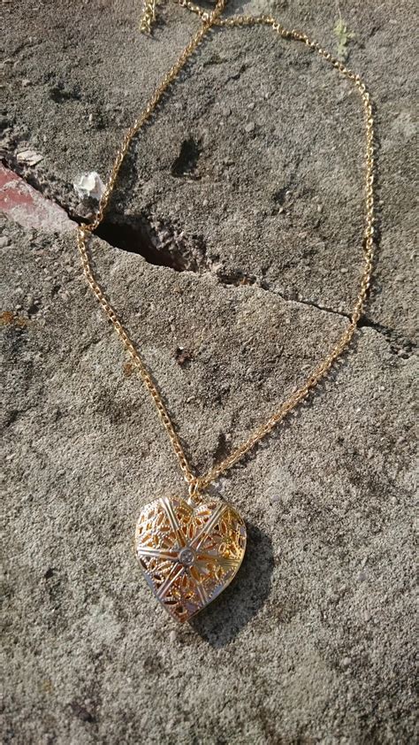 Golden heart necklace 1 by angela-sparkle on DeviantArt