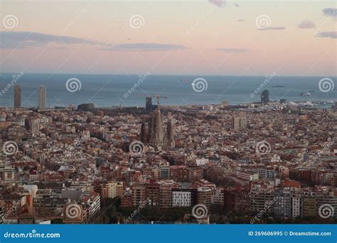 Aerial View of the Barcelona Cityscape with a Colorful Sky in the ...