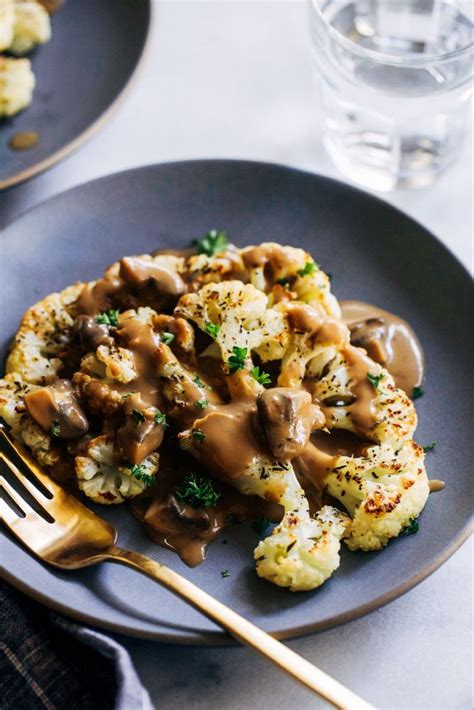 Cauliflower Steaks with Mushroom Gravy By OhMyVeggies.com | Recipe | Cauliflower steaks, Vegan ...