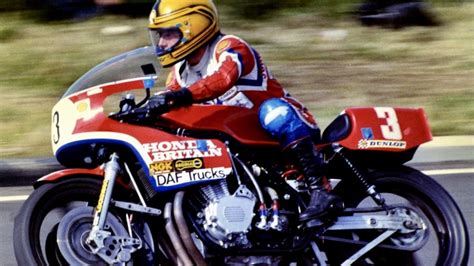 Man Riding Red Motorcycle