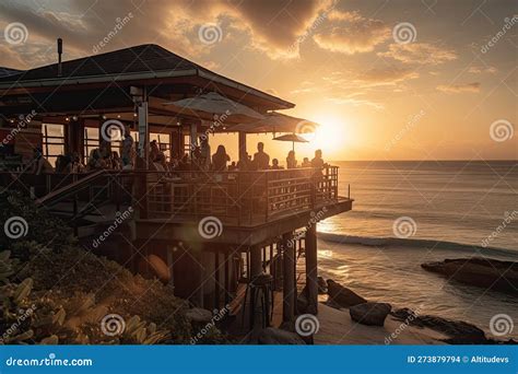 Beachside Restaurant, with the Sun Setting Beyond the Horizon and ...