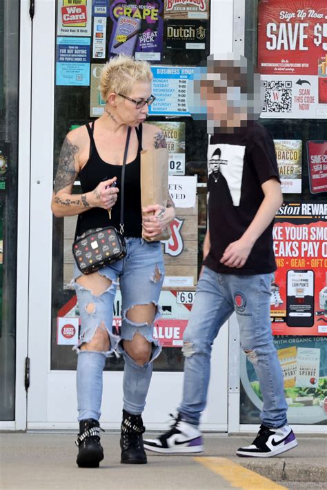 Eminem's ex Kim grabs pizza with rarely-seen teenage son Parker in new ...