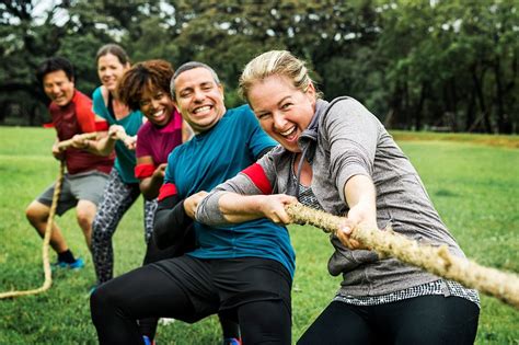 Team competing tug war | Premium Photo - rawpixel