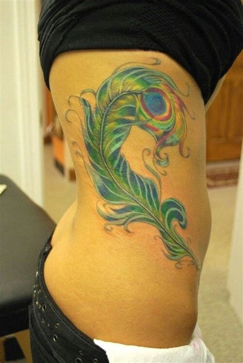 Tattoo 3 | Feather hip tattoos, Feather tattoos, Tattoos