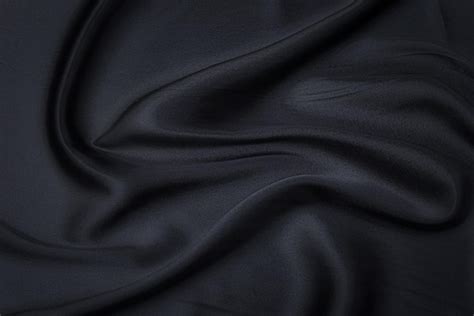 Premium Photo | Silk or cotton fabric tissue dark gray or black color texture background pattern