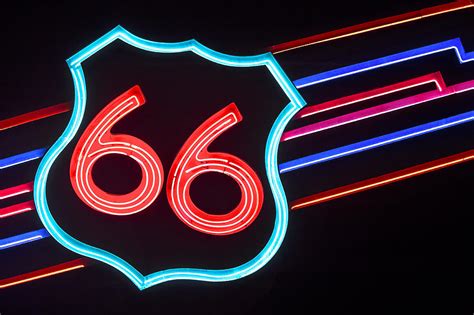 ROUTE 66 - Neon Road Sign Photograph by John Wayland