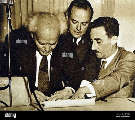 Photograph of David Ben-Gurion signing the proclamation of independence ...