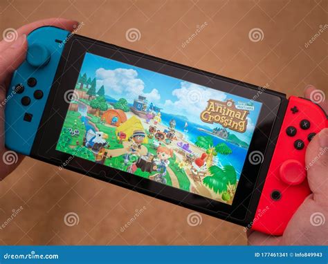 UK, March 2020: Nintendo Switch Games Console Hand Held Animal Crossing New Horizons Editorial ...