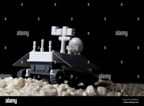 space program - lunar rover walking on lunar surface Stock Photo - Alamy