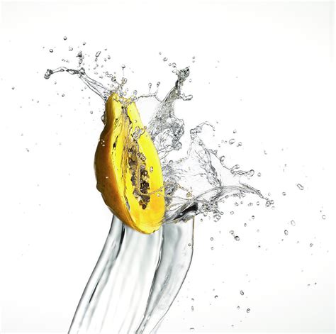 Mango Splash Photograph by Bill Cahill