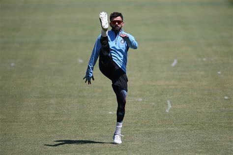 Virat Kohli warms up for India's training session | ESPNcricinfo.com