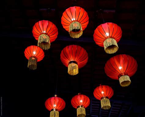 Red Paper Chinese Lanterns Hanging On Ceiling by Lawren Lu