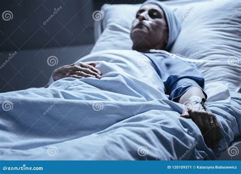 Sick Woman Lying in Hospital Bed with Venflon on Hand during Chemotherapy Stock Image - Image of ...