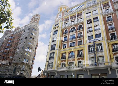 Buildings in Gran Via, Madrid Stock Photo - Alamy