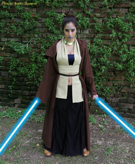 jedi woman brown robe 2 lightsaber