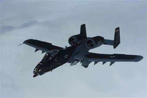 A black and grey A-10C Thunderbolt II from the Indiana ANG’s 122nd Fighter Wing “Blacksnakes ...