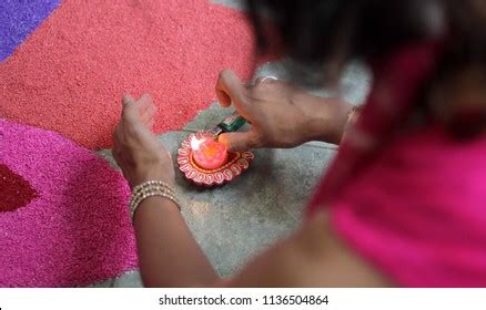 Girl Lighting Diya Light During Diwali Stock Photo 1136504864 | Shutterstock