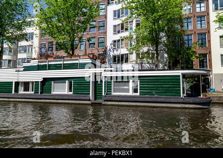 Floating houses in Amsterdam, Netherlands Stock Photo: 56935848 - Alamy