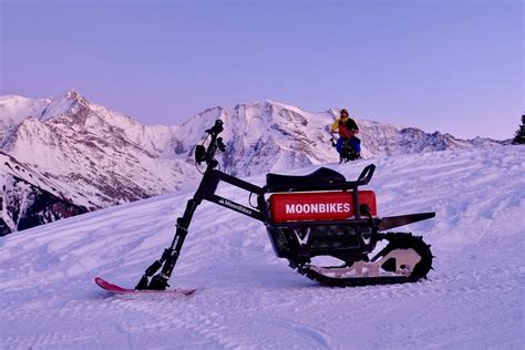 Full-throttle electric snow bikes quietly tear up Alpine powder