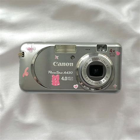 Canon Silver and Pink Cameras-and-accessories | Depop