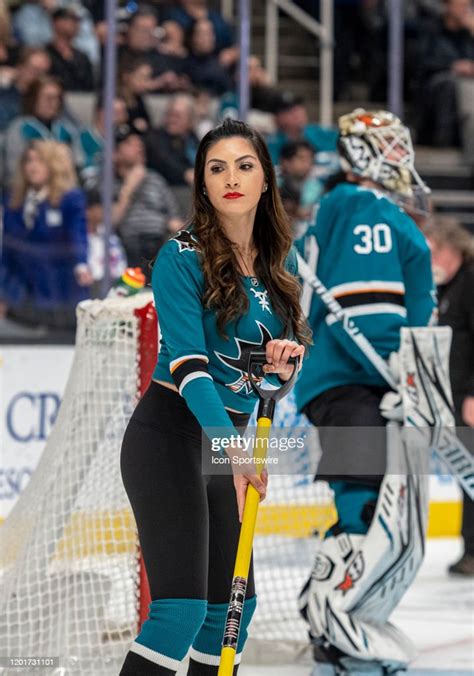 A member of the San Jose Sharks ice crew works the ice during the... News Photo - Getty Images