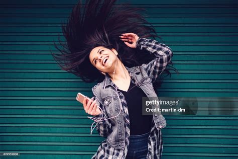 Happy Girl Dancing High-Res Stock Photo - Getty Images