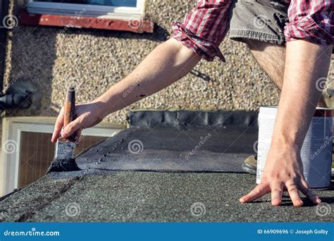 Sealing Roof, Home Maintenance Improvement DIY Stock Photo - Image of hands, makeover: 66909696