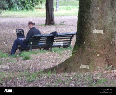 man working on laptop outdoors Stock Photo - Alamy