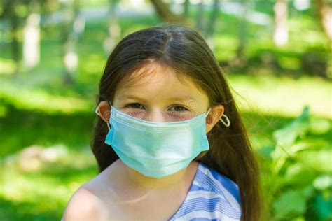 Little Girl with Mask, Pretty Girl with Medical Mask in Park Stock Photo - Image of care ...