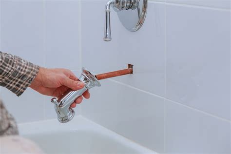 How To Replace A Bathtub Faucet In 4 Easy Steps