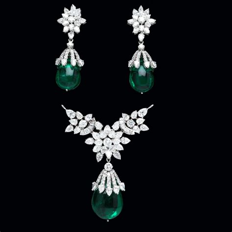 Indian Jewellery and Clothing: Emerald Pendant sets from PC Jewellers..